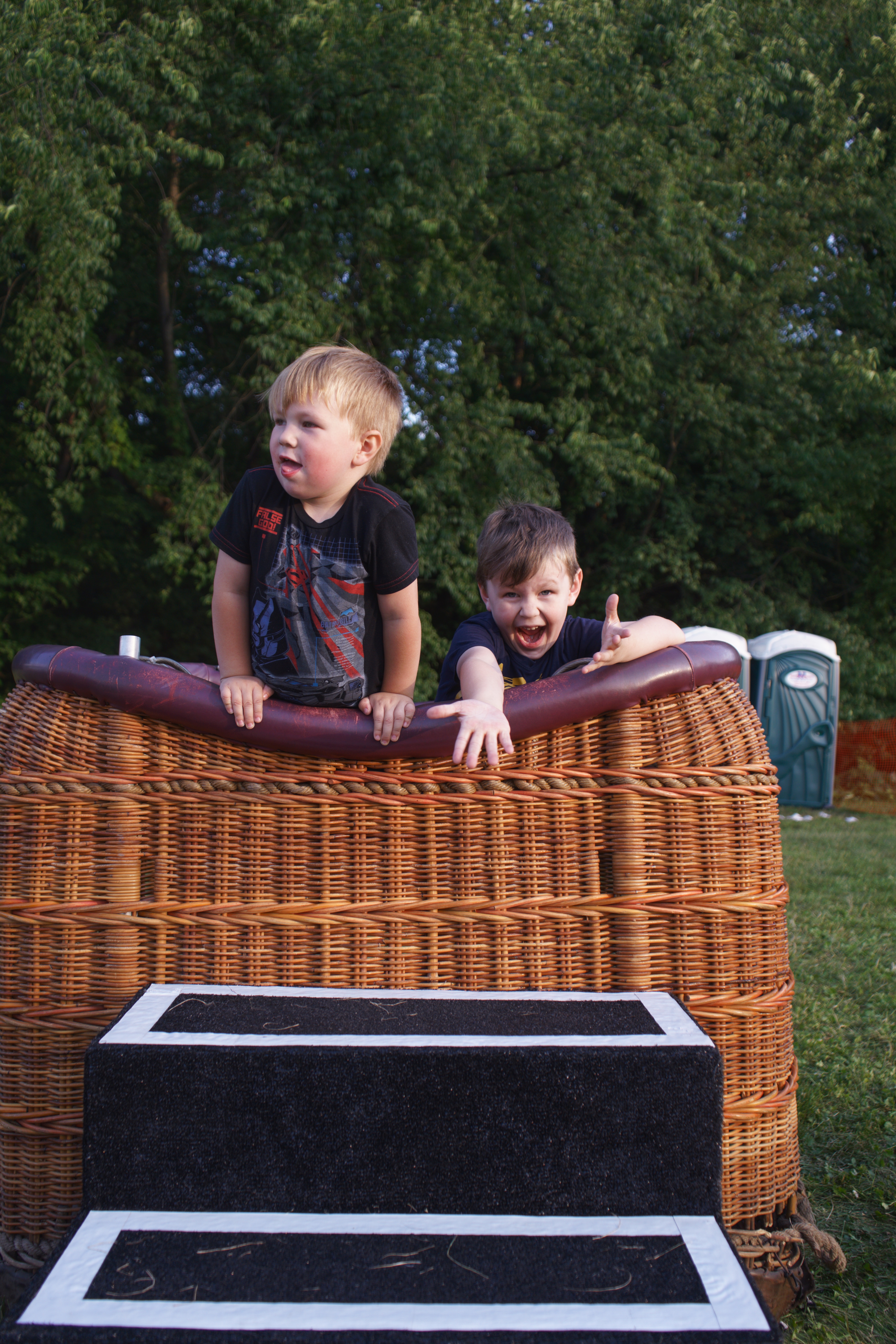 two boys in a basket